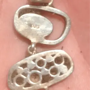 Silver (bracelet part) marked 925. 1st silver jewelry ever found.