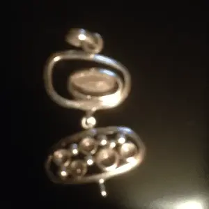 Front of silver bracelet piece