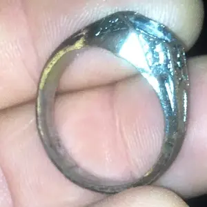First ring, silver played copper ( I think)
