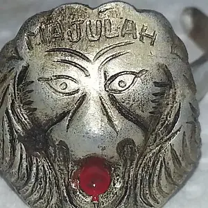 Found by a pavilion.  Says 'Majulah' on the front and Hong Kong on one of the tabs.  Maybe pressed tin?