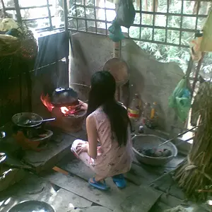 Cooking breakfast.  mekong delta.