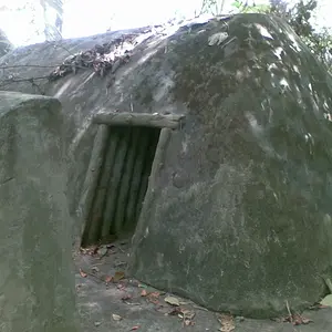 VC bomb shelter.
Note the blast wall on the left.