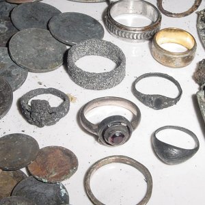 3 BEACH HUNT RINGS = A 10K BAND- 6 SILVER RINGS AND A JUNK SPINNER