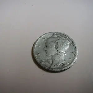 1917 Mercury Dime (Winged Liberty) Found in Vacant lot, same lot as the Potts token.