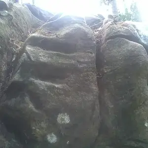 site 4: marker... i found this marker at the top corner of the very big solid rock... you can notice  the carved at the upper right corner with a carv