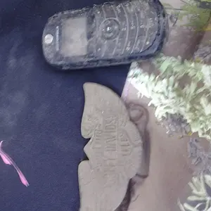 20 sep 2013 finds. Belt buckle and at&t cell phone