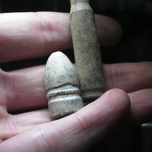 Confederate Minie' ball and modern shell casing