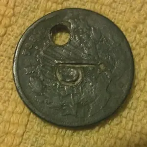 1864 2 cent with cannon stamped on it.
