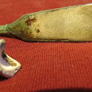 Soldier "J. Wright" and his carved bullet. Found in a Confederate picket camp.