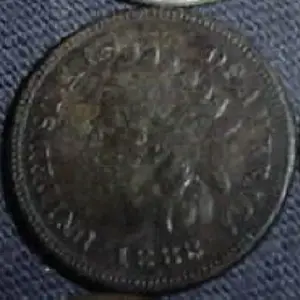 I held a contest when I was home on leave for whoever could guess closest to the oldest coin found while I was home. This 1883 IH was the winner