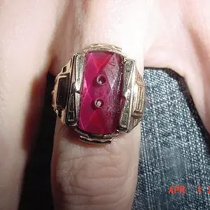 A 10K 1966 class ring found in Fremont, MI. The crest is gone  and the band is split (lawnmower strike?) But my guess is that it's from Fremont High S