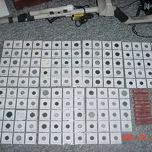 All of my goodies to date (2006) with my Explorer XS. I put my good finds in albums in the order that they were found without regard to type or denomi
