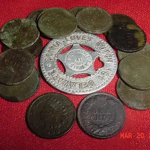 2 Indians, an aluminum good luck token, and a bunch of Wheaties found in Muskegon,  MI.