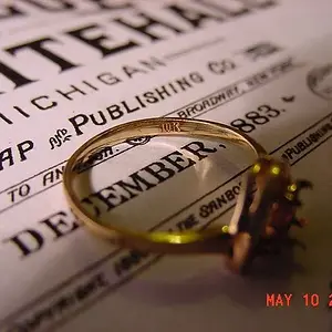 10K hallmark. The ring has a small diamond but the larger setting was missing. I am led to believe that it was an opal because I'm told that they will