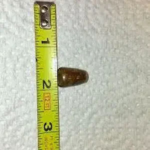 50 cal. Brass hollow point.
   Northville