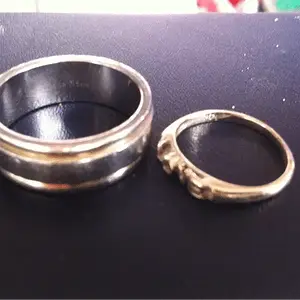 Ring 31 and 32, stainless and 14k,