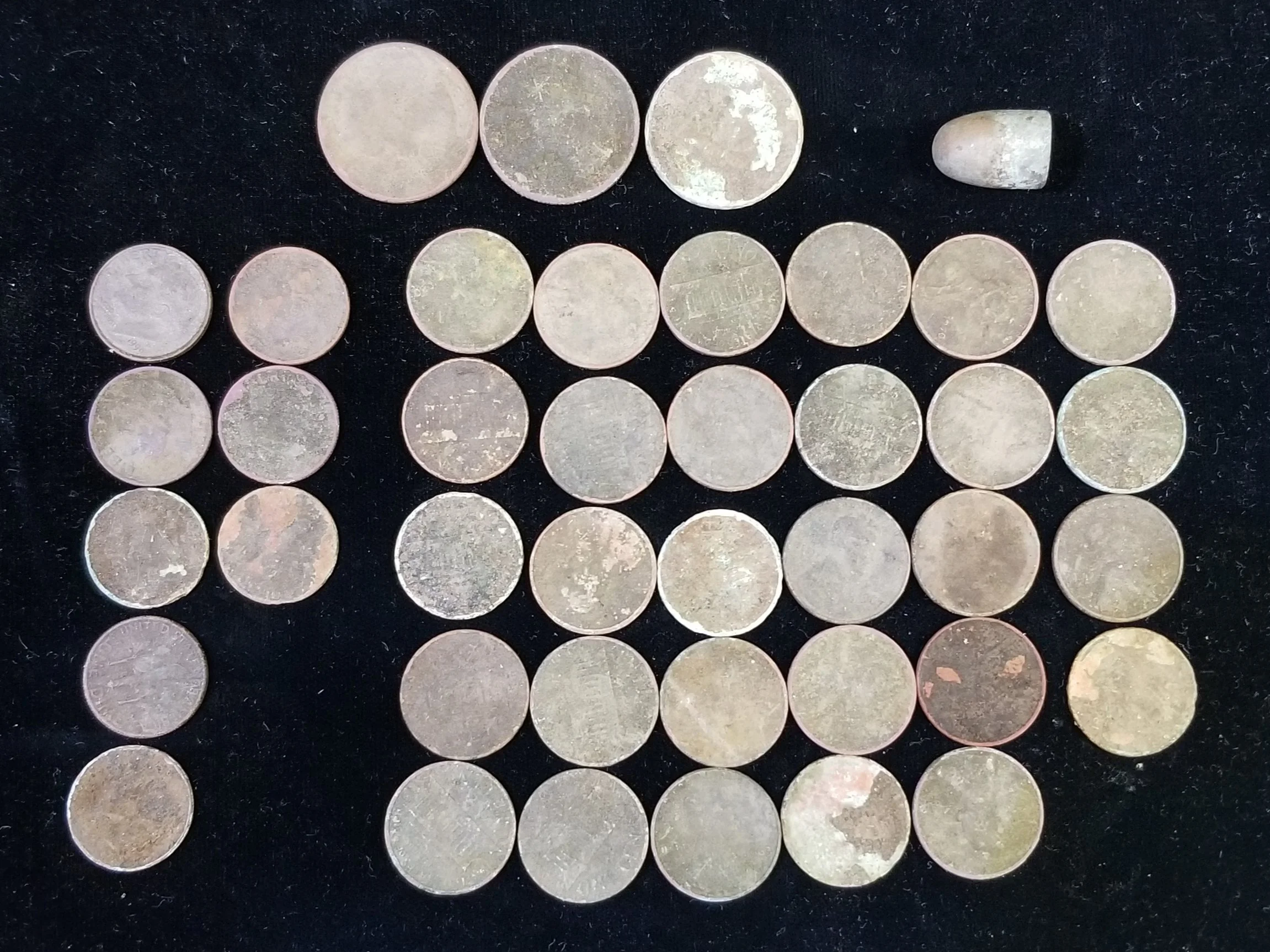 $1.79 in Clad and one 9mm Bullet, April 15