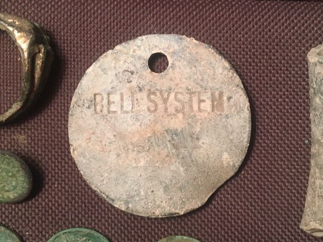 12-21. Bell System tag.