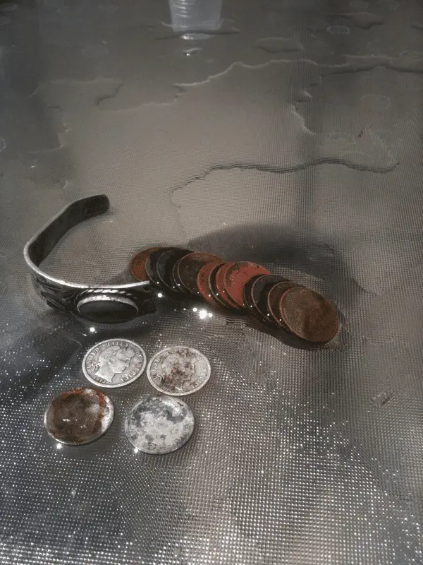 120 year old hunted out park 8-5-2012. 3 barbers one merc and a chunky piece of a native sterling bracelet