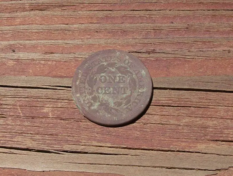 1851 Large Cent, Reverse - Here's the back of the LC cleaned up.

And here's the link to the story:

http://forum.treasurenet.com/index.php/topic,1616