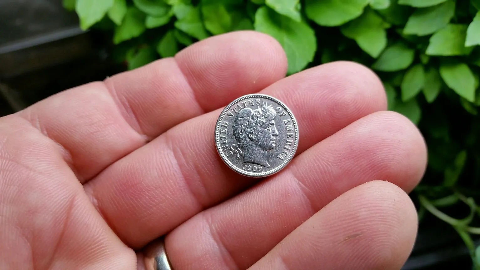 1909 S found in yard of 1900 built residence.