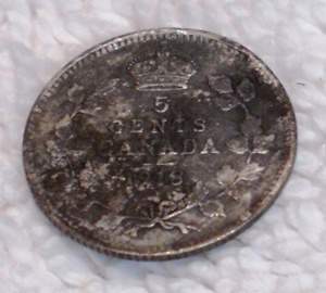 1918 Silver Nickel - This was a surface find at the base of an old tree, likely surfaced due to erosion. Found at Lakeview Park, Oshawa ON.