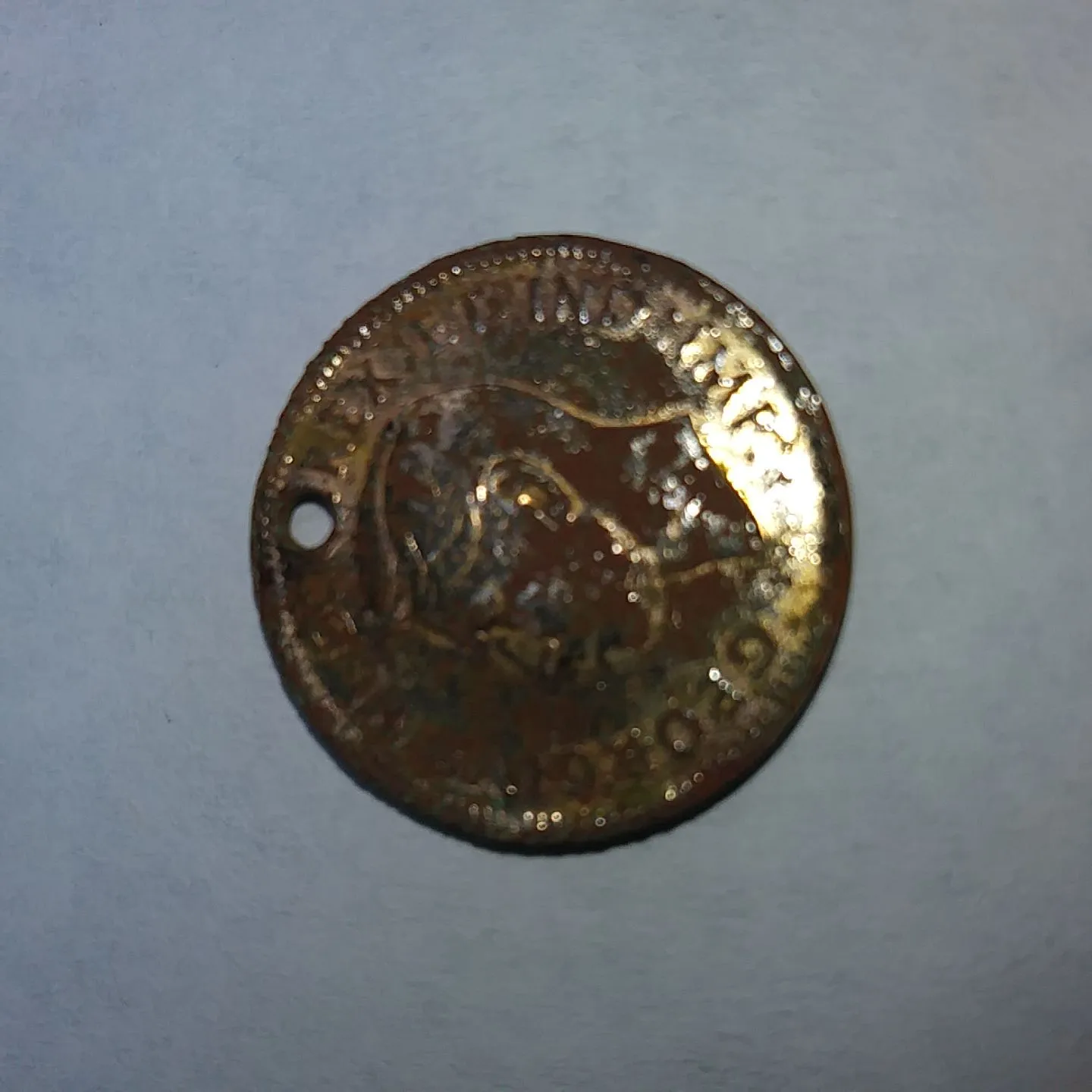 1942 Canadian Cent with hole (Front)
