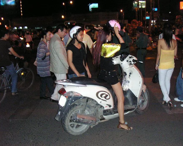 2 girls on motorbike