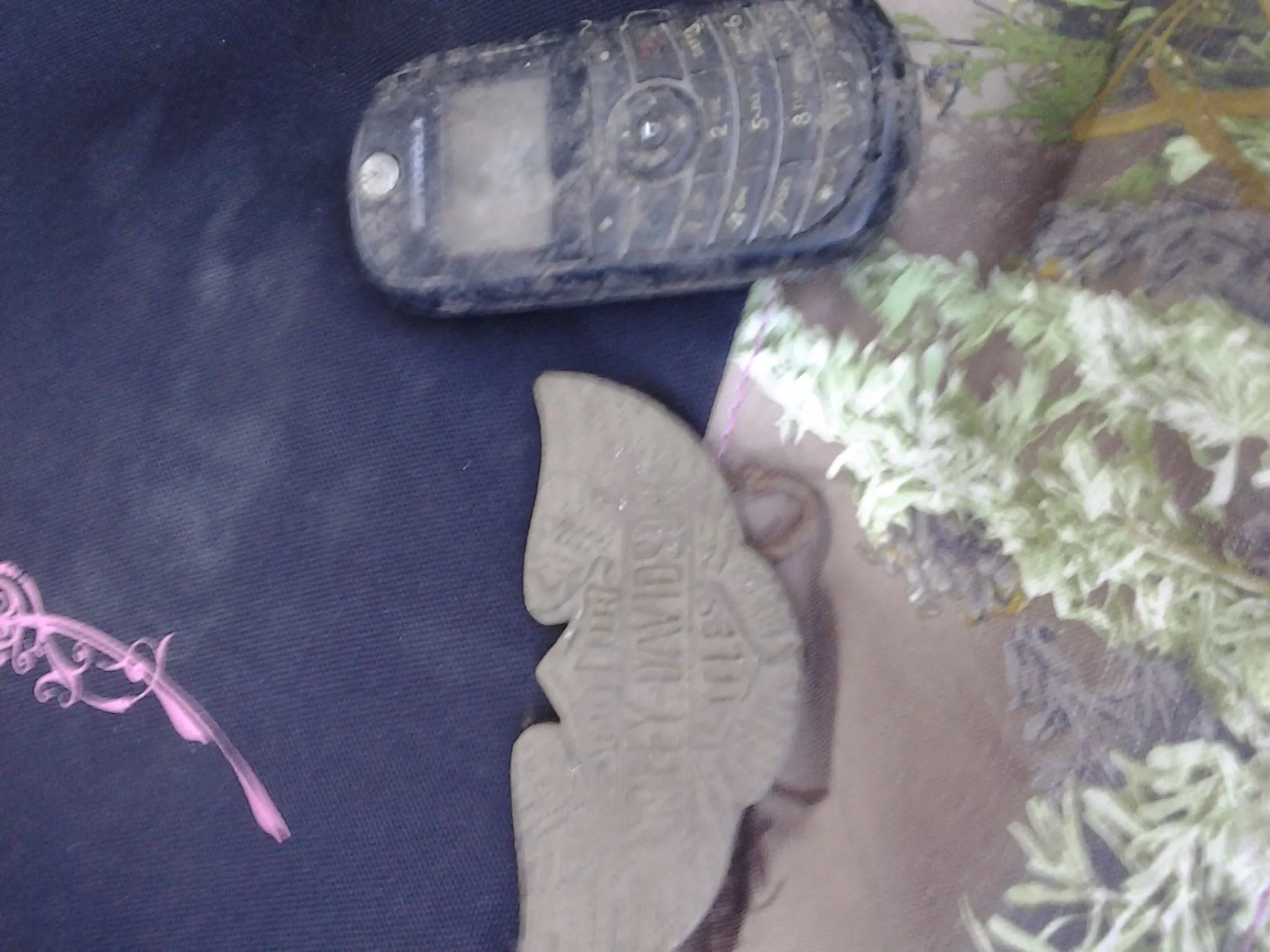 20 sep 2013 finds. Belt buckle and at&t cell phone