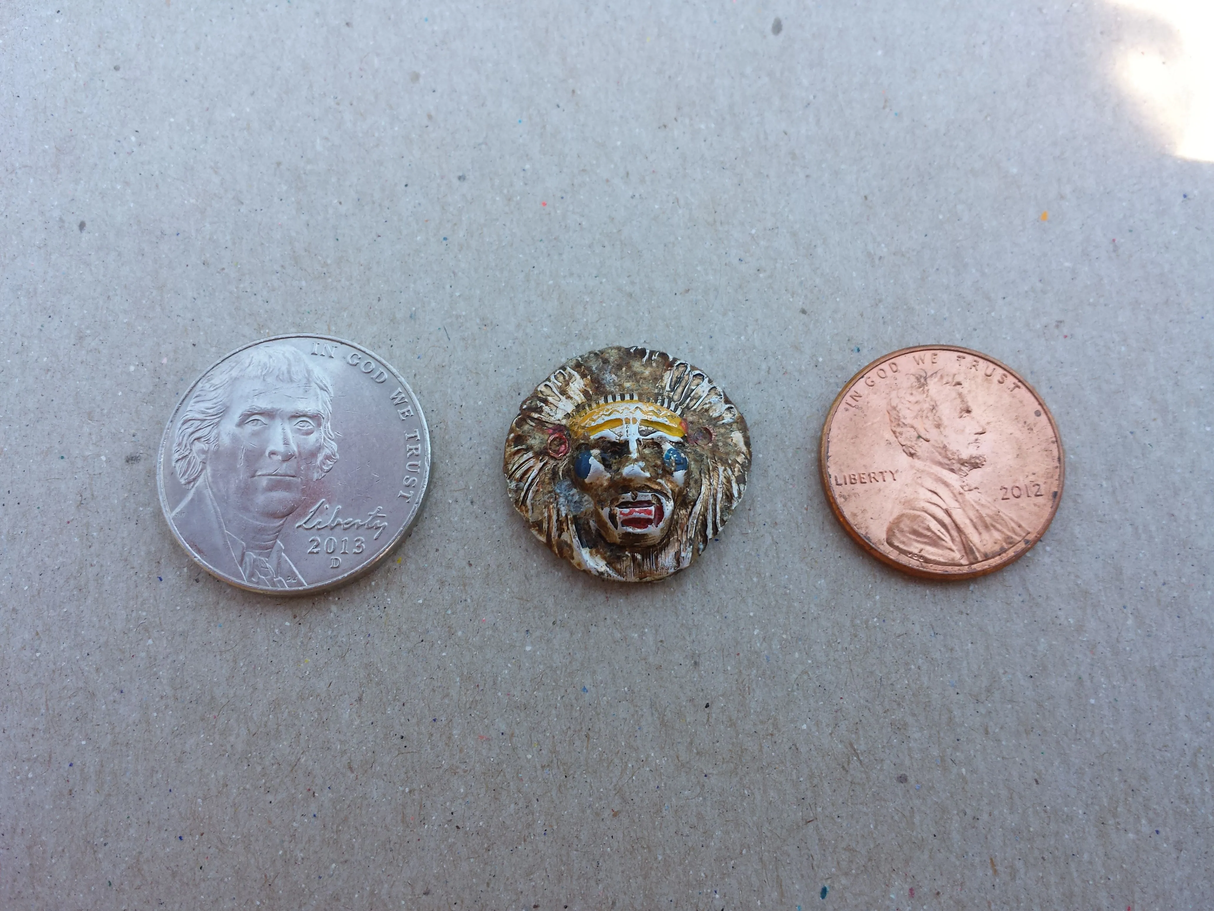 20150801 The top of a 1960s gumball ring found in Lakeland Park with the F75.