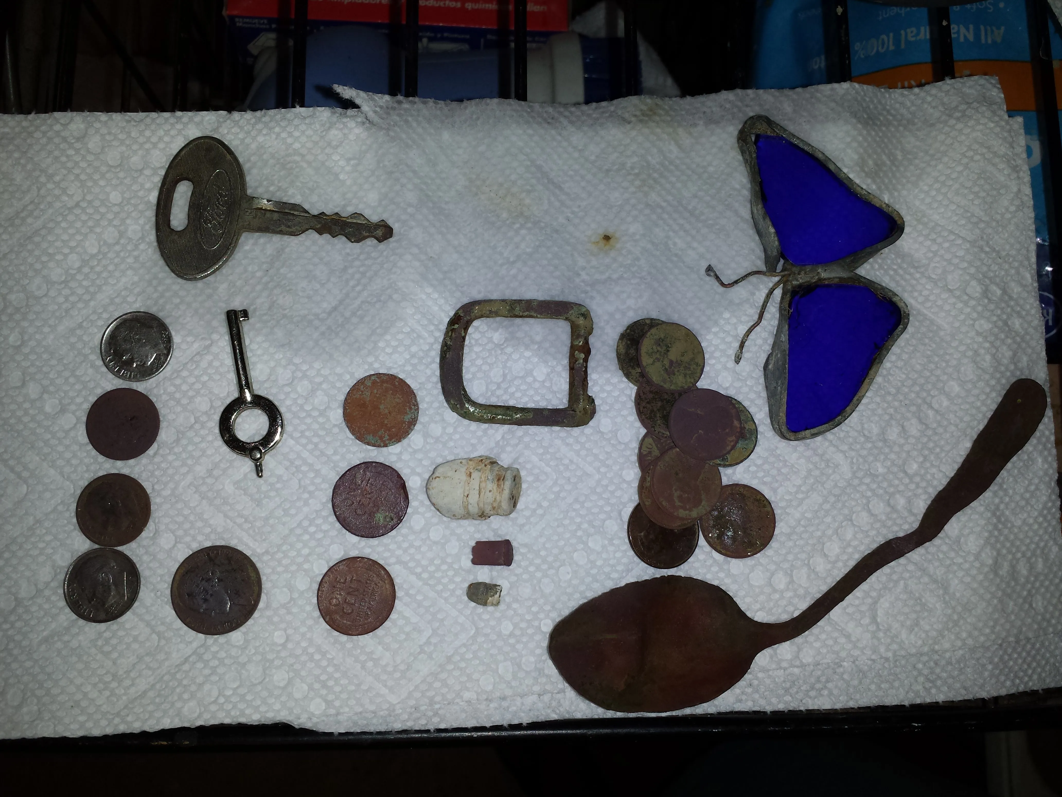 20150912 A collection of stuff dug on private property in Madison with the F75. Included are a 1952d silver Roosevelt, some clad, an old Ford key, a h