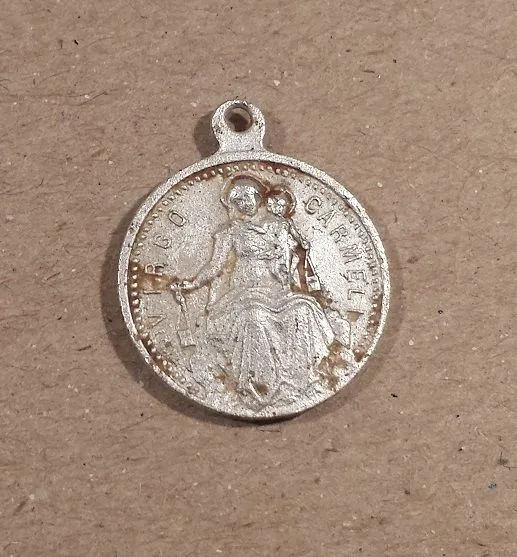 20151107 Religious pendant found in Livingston Park with the CZ20.