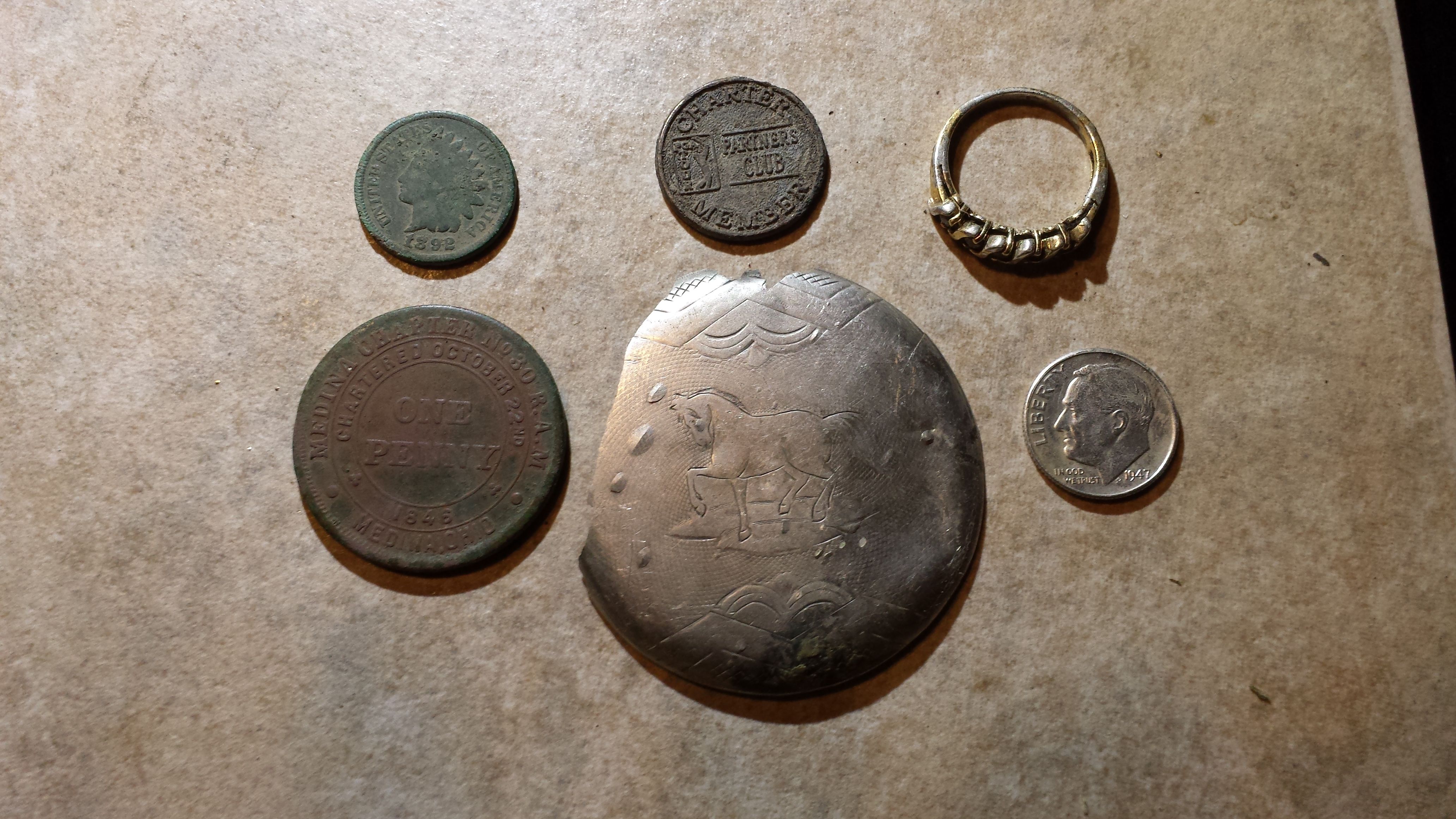 20151122 172422  Shawn's house notables.  1892 IHP, 1947D Rosie, Medina Masonic Penny Token, Plated ring, SIlver pocket watch piece.