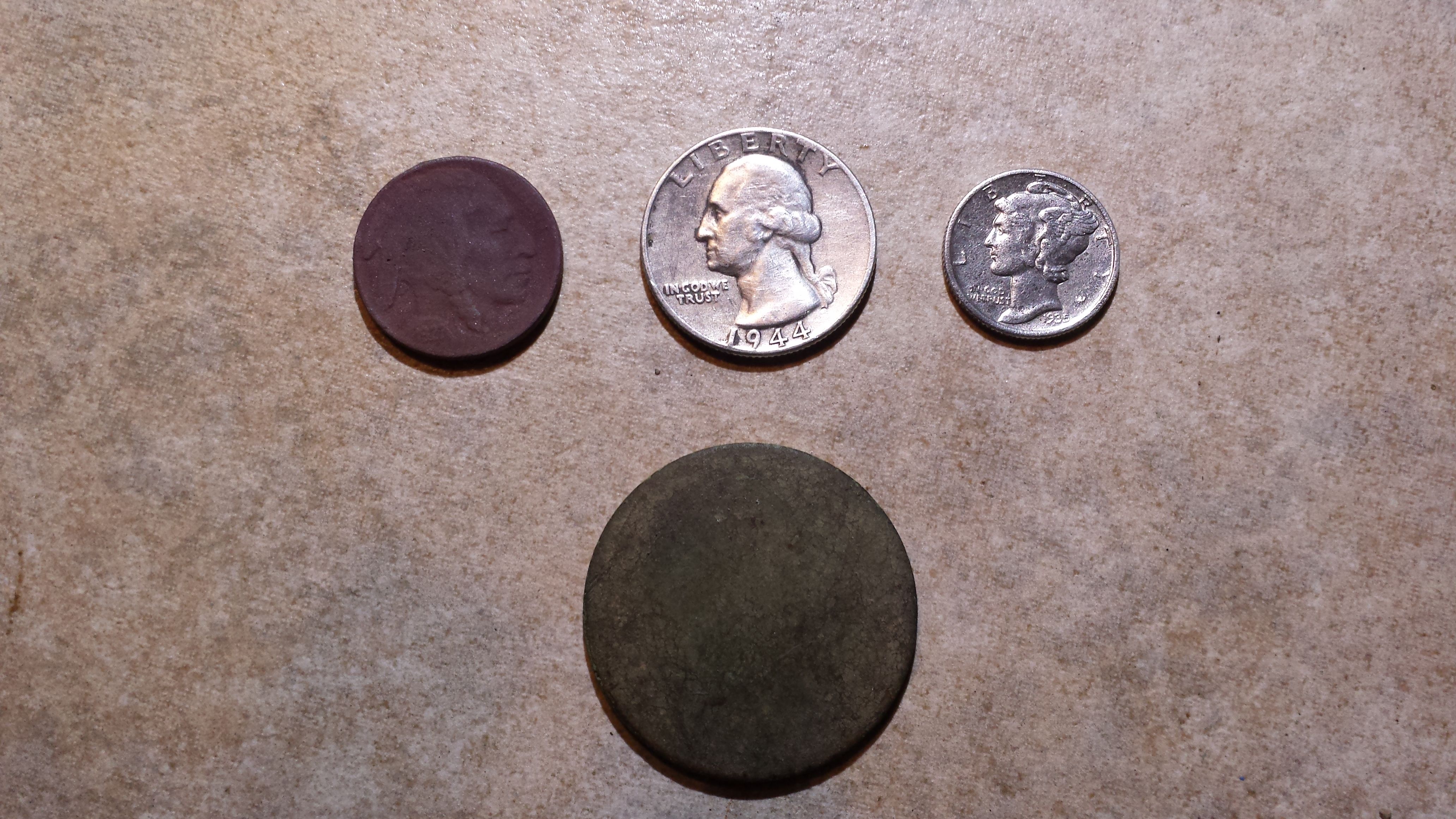 20151127 182020  Notables from curb strip by cemetery.  1927 Buffalo, 1944 Quarter, 1935 Merc, &  Bronze disk