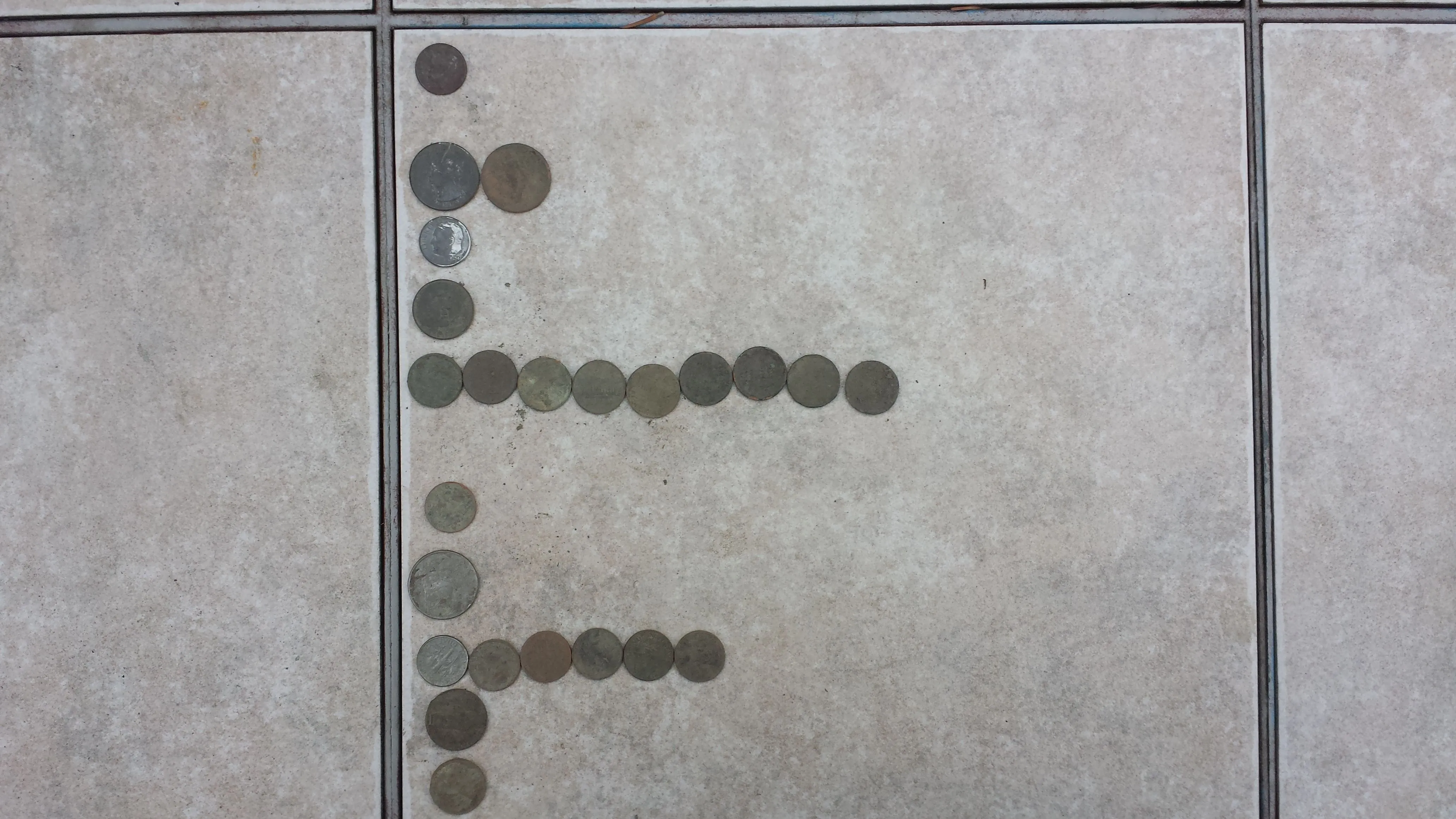 20151129 162647  1 dime from a previous hunt, ELY cemetery curb strip 1947 Rosie, Elyria Catholic by ball field, & S Amherst school by soccer field.  