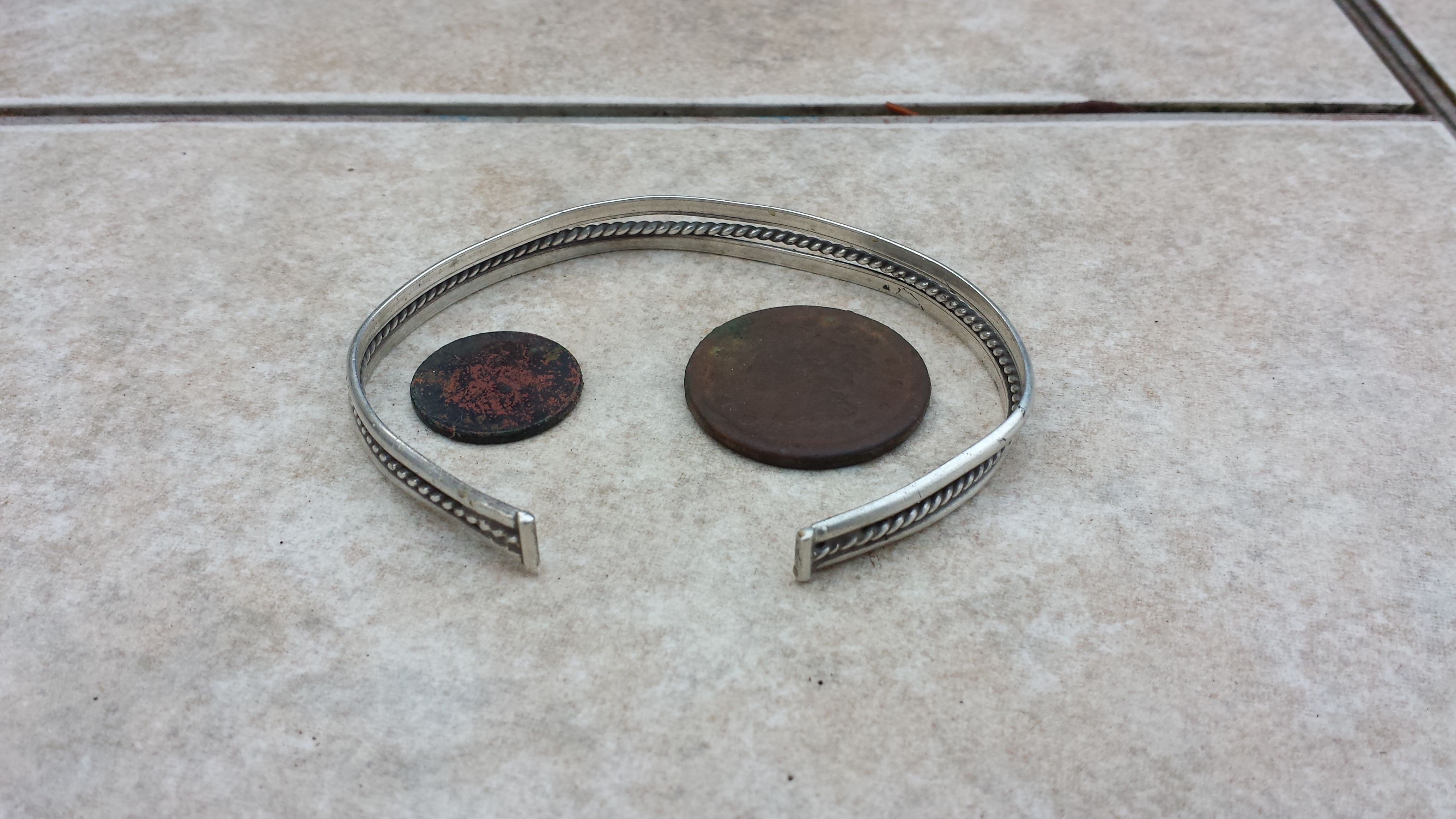 20151205 155954  Barb's house notables  1851 LC, 1941 wheat, and silver bracelet.
