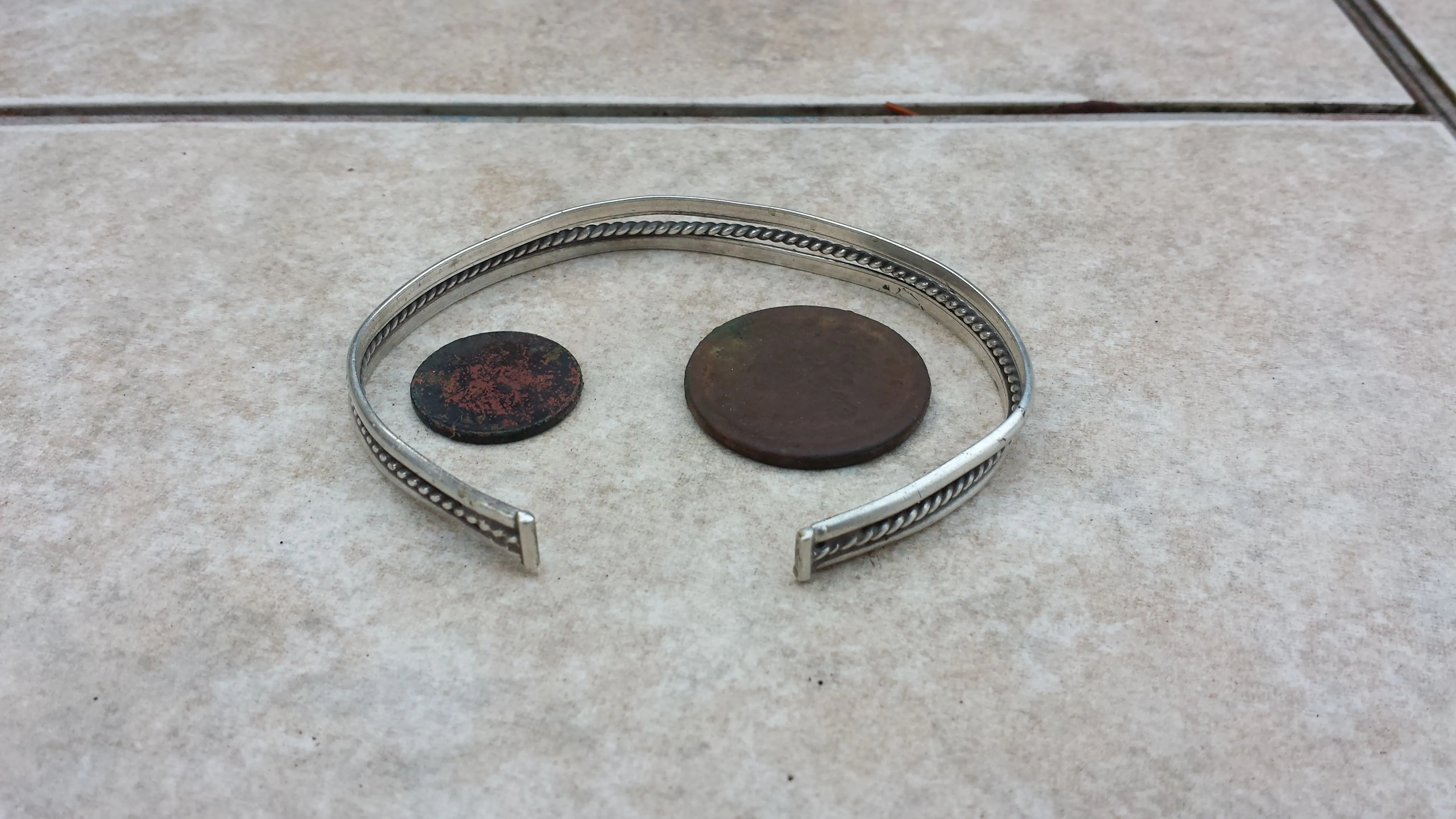 20151205 155954  Barb's house notables  1851 LC, 1941 wheat, and silver bracelet.