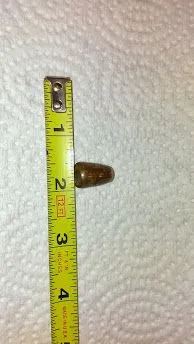 50 cal. Brass hollow point.
   Northville