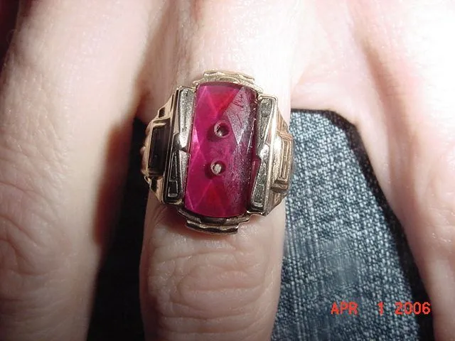 A 10K 1966 class ring found in Fremont, MI. The crest is gone  and the band is split (lawnmower strike?) But my guess is that it's from Fremont High S
