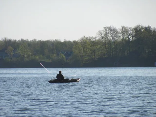 A single local kayak fly fisherman... Sodus Bay, NY