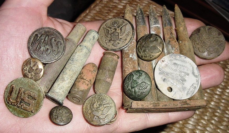 A SMALL SAMPLE OF FINDS FROM A WW I TRAINING CAMP SITE - MANY SHELL CASINGS, BUTTONS AND OTHER CAMP ITEMS ALONG WITH OLD COINS HAVE BEEN FOUND HERE