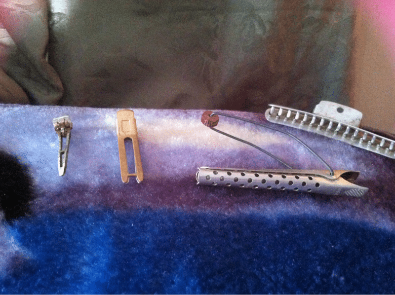 All are curling tools made in Hollywood. Also made of metal and aluminum. Two different types of clips ( pin curl clips and krippies) and metal curlin