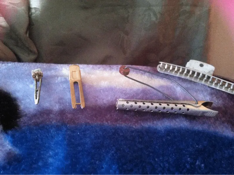 All are curling tools made in Hollywood. Also made of metal and aluminum. Two different types of clips ( pin curl clips and krippies) and metal curlin