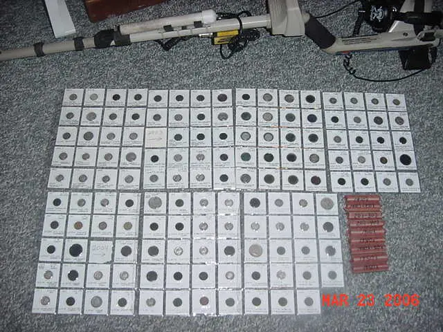 All of my goodies to date (2006) with my Explorer XS. I put my good finds in albums in the order that they were found without regard to type or denomi