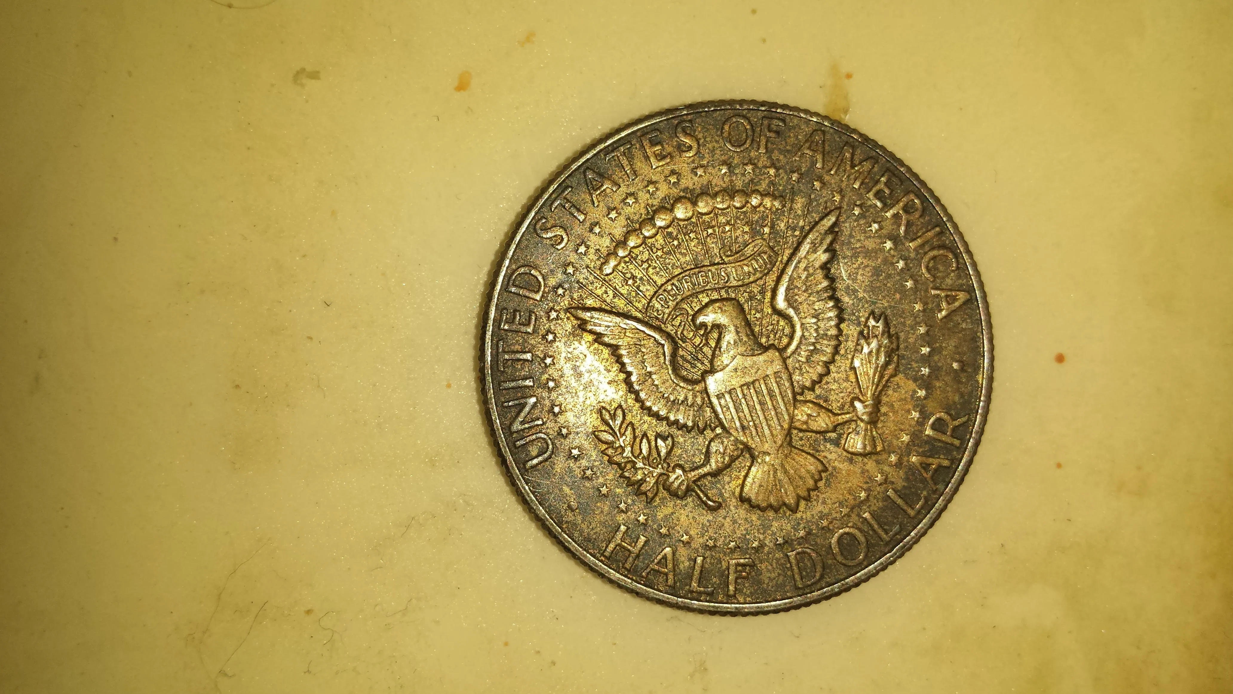 back of kenedy half dollar