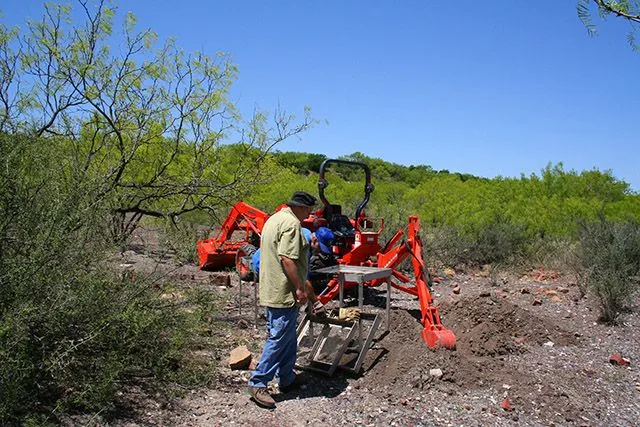 Backhoe and sifting in a Texas ghost town.