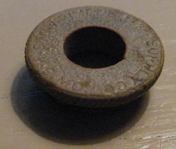 Brass packing nut from a hit & miss engine - Found at an old barn site in the western edge of Kansas City metro area.  Spring 2009.