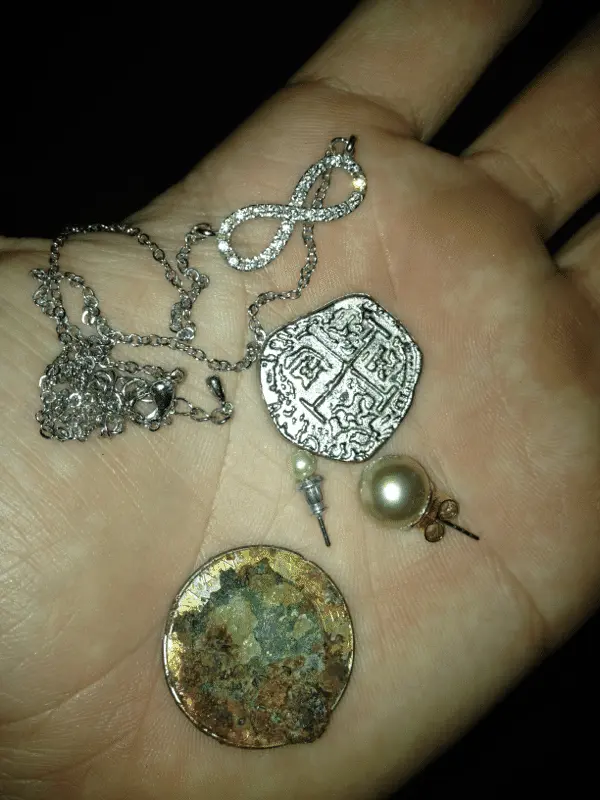 Coin on the bottom is Italian, not worth anything but cool find.