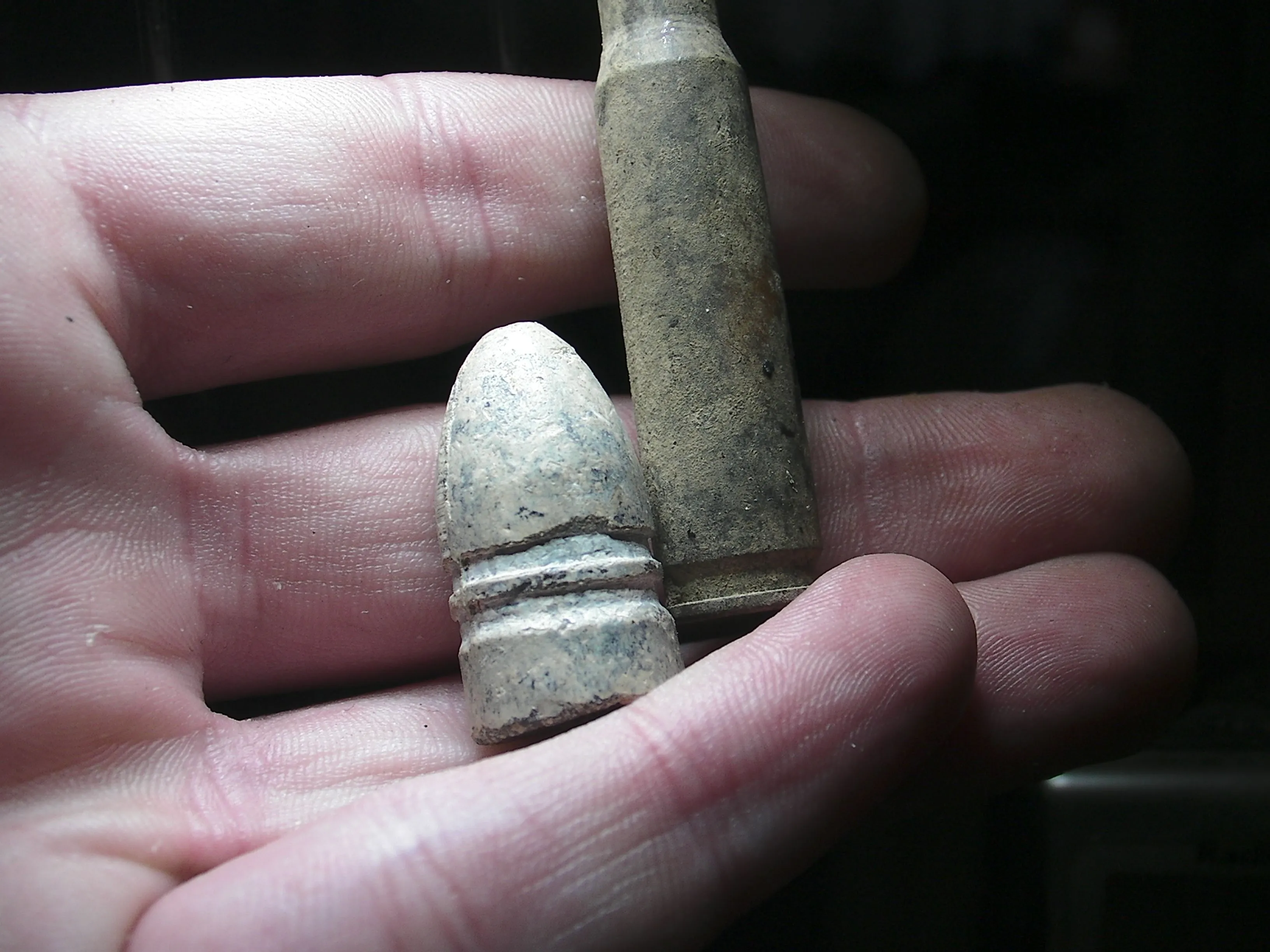 Confederate Minie' ball and modern shell casing