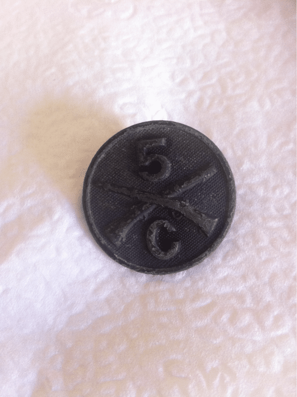 "Crossed Rifles" button. Found in Petaluma,CA. Dated as early 1900's